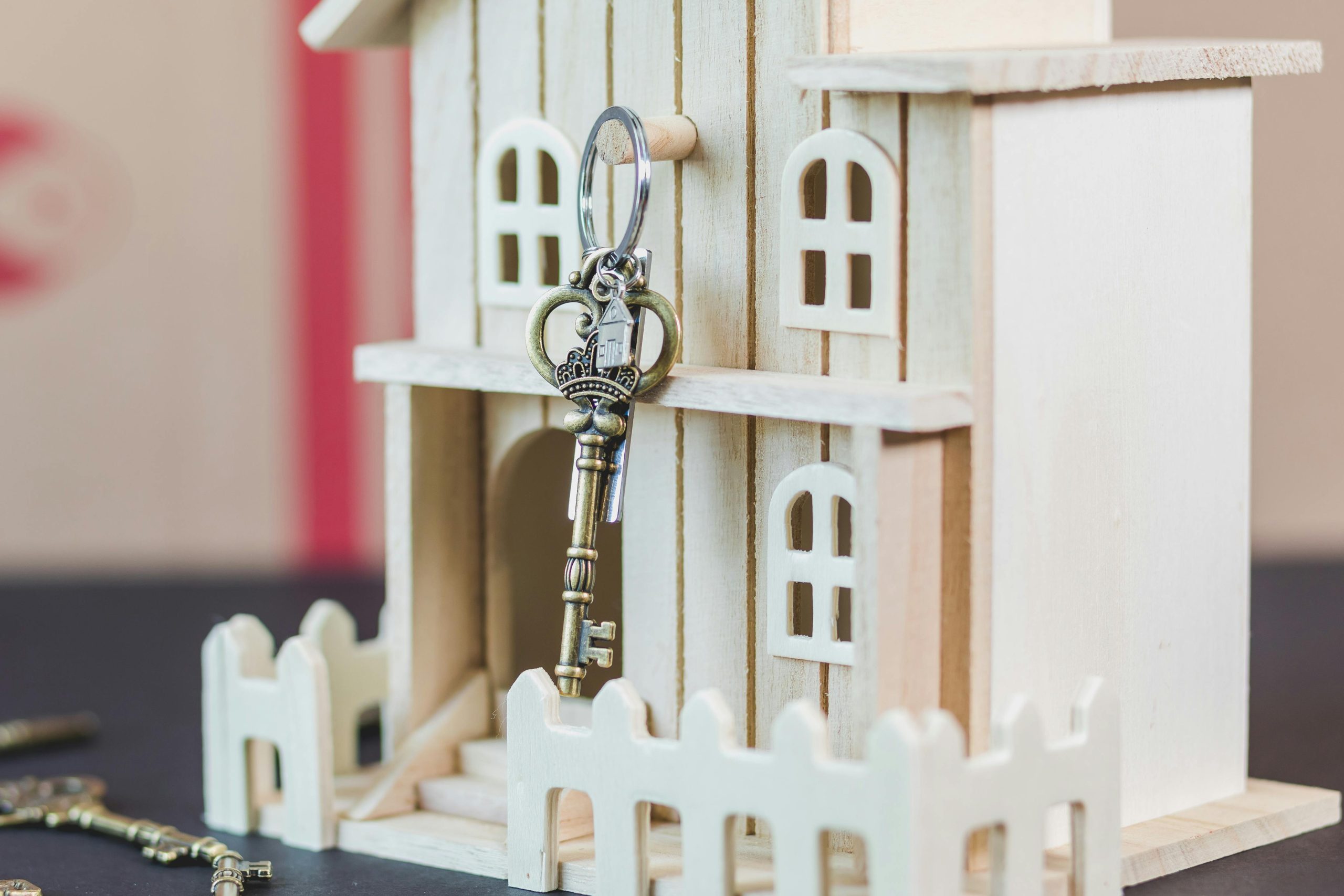 Advice Key Hanging on Wooden Doll House
